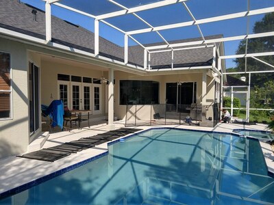 premier orlando installing pool safety fence around pool cool deck in orlando.